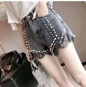 Denim-Shorts Frauen mit hoher taillierter neuer koreanischer Version des Sommers Thin Thin Thin Ripped Hot Hosen Perlen Spitzen-Spitze mit weitem Bein