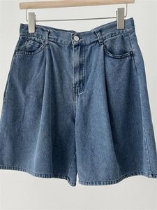 Kvinnors shorts denim hög midja lös sommar 2024 Kvinnliga tillfälliga korta jeans med fickor