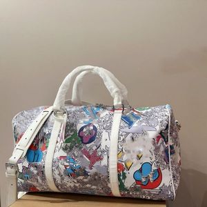 24SS herr- och kvinnors lyxdesigner graffiti resväska kvinnors handväska axelväska crossbody väska resväska duffel debf