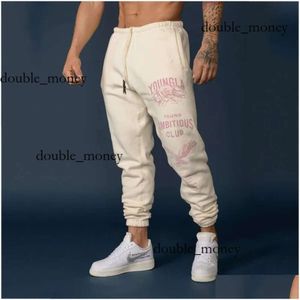 Youngla Pant Mens American Style Sports Leisure Gym Running Fitness Training Pants Drop Delivery Apparel Womens kläder Black White Blue Red 819