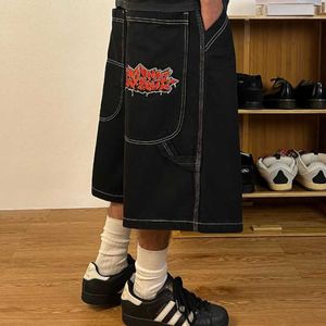 Broderad lös denim shorts mens skateboard beskuren hiphop bred ben