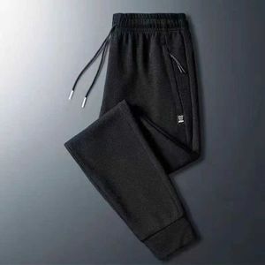 Calça masculina masculino ou inverno calças casuais masculas de imitação grossa com zíper de algodão trabalham grandes jogging q240429