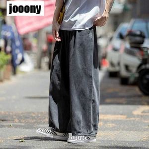 Męskie spodnie Męskie dżinsy Hip-Hop Street Clothing Deskips Neutralny dżinsowe spodnie Męskie Duch szerokości nogi luźne proste kieszenie Q240429