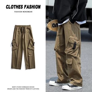 Męskie spodnie w stylu japońsku vintage pary ładunkowe streetwear bawełniane multi-kupki spodnie Men Cityboy workowate swobodne luźne sznur