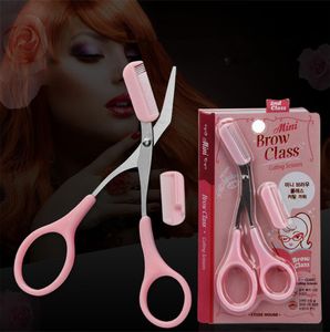 Розовые ножницы триммера с бровей с расчесыванием для устранения волос с уходом за волосами для волос.
