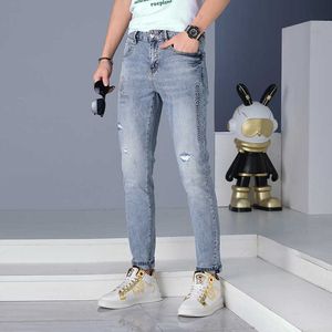 High-end European Trendy Casual Pants for Spring and Summer 2023 Versatile Fashionable Thin Distred Light Colored Jeans Men in