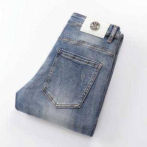 Kong Hong High-end dżinsy męskie Sezonowe modne elastyczne slim fit spodni dla stóp