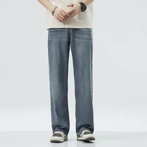 Męskie dżinsy przytulne miękkie lyocell materiał letni cienki oddychający oddychający luźne dżinsowe spodnie elastyczne talia swobodne spodnie