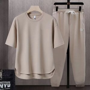 2024 Summer Mens Loose Tracksuits Fashion Round pescoço de manga curta Pantagens de cordas