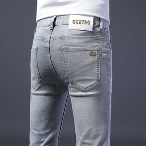 Brand Trendy Light Gray Jeans for Mens European High-end Summer Slim Fit and Versatile Elastic Casual Pants with Small Feet