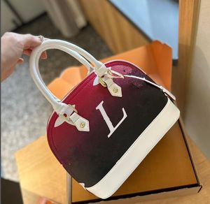 Women's shopping bag brand name bag louisevitionbag Double handle leather color-changing design long shoulder strap louisevitionbag shell bag 25cm