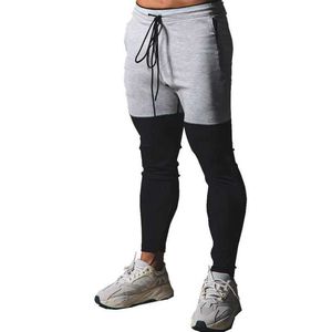 Mäns byxor kontrast färg män jogging byxor sport byxor herr gym träning fitness bomull byxor mens casual mode tight bants j240429