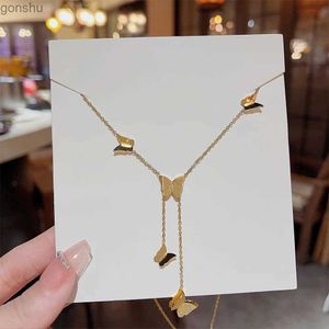 Colares de pingentes de colar de borboleta dourada de aço de titânio adequado para jóias de moda feminina e colares de alta qualidadewx