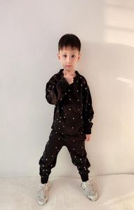 Hochwertige Jungen Mädchen Mädchen Sportkleidung Sets Herbst Schwarzer Kapuzen -Sweatshirts und lose Hosen Teenager -Schuljunge Outfit1338584