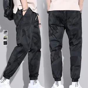 Calças masculinas Camuflagem de vários bolsos Homens de calças de joggers harém harém rápido secagem de tração solta calça de moletom casual