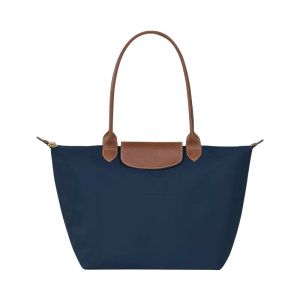 Дизайнерский бренд бренд бренд сумки портативный пельмени повседневная нейлоновая сумочка роскошная мода и женщины должны иметь весну и лето