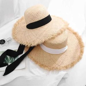 Chapéus de balde largura Chapéus de balde de moda feita à mão 100% Natural Raffia Dame Top Big Brim Str Hat Hat Beach Girl Férias Panamá Protetor solar respirável Hat chapéu por atacado J240429