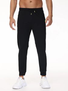 Pantaloni da uomo pantaloni sport asciutti rapidi per uomini che gestiscono yogapants pantaloni joggers uomini 240424