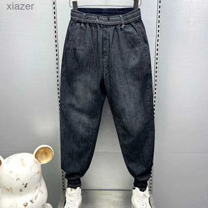 Jeans masculinos Mens 2024 Primavera/verão Jeans elásticos Casual HARLAN Pontas pretas partidas completas de calça de bolso da cintura elástica coreana WX