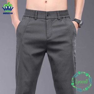 Mäns byxor Nya kläder för våren och sommaren ny tunna elastiska lyocelltyg Mens Casual Pants Ultra-tunna midjeverksamhet Gray Q240429