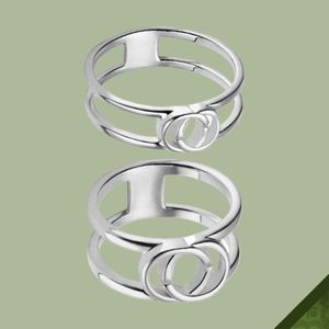 リングカップルリングデザイナーGラグジュアリージュエリーBijoux Wedding Engagement Interlocking Open Band Silver New Fashion High Quality Womens Mens無料配送卸売