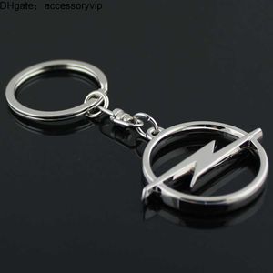 S/ロットファッションメタル3DカーキーチェーンキーチェーンキーリングキーリングChaveiro Llavero for Opel Auto Pendant Carアクセサリー卸売