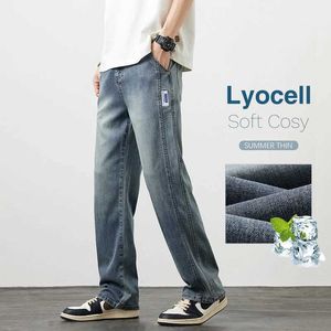 Mäns jeans sommar Ny ultratunna löst raka jeans lyocell bekväma byxor koreanska mode retro blå och svarta jeans J240429