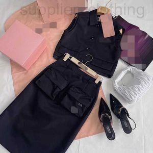 Two Piece Dress designer Handsome, sweet, cool, functional style set with short lapel sleeveless vest top, double pockets, high waist, buttocks wrapped skirt OURX