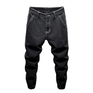 男性用の黒いジーンズハーレムパンツルーズフィットバギーパンツテーパーストリートウェアメンズ衣類デニムズボン到着