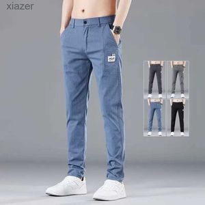 Mäns jeans vår sommar elastiska midja design herrar tunna casual byxor koreansk mode bomullssträngsaffär byxor man grå blåwx