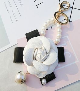 Leder Camellia Flower Keychain Schlüsselring für Frauen Leder Blütenbeutel Charm Glass Perlen Schlüsselkette Gold Auto Keyrings7323791