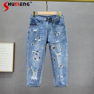 Kvinnors jeans rippade denim beskurna byxor för kvinnor trendiga 2024 sommaren hög midja lös bantning europeiska varor strass baggy