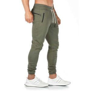 Calça de algodão masculino Caixa de corrida calças de corrida homens calças de corrida hip-hop Street Sportswear Casual Troushers Sports Soles Sports Sports Pants Fitness Legsl2405