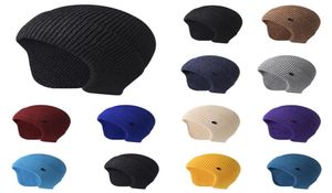 2st. Höst- och vinter stickade hatt män och kvinnor039s fast färg varm öronskydd beanie utomhus cykel ull hatt skidåkning7163037