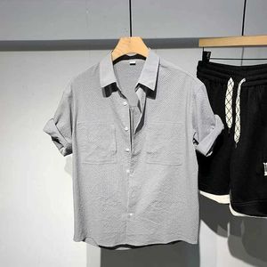 Men's Polos 2024 New Summer Trendy Mens High end Versatile Polo Neck with Dark Pattern Thin Loose Casual Super Roll Short SleevesL2403