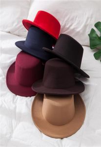 Ny klassisk solid färg filtfedoras hatt för män kvinnor konstgjord ull blandning jazz cap wide breim Simple Church Derby Flat Top Hat6300788