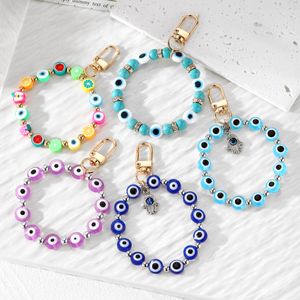 Färgglada runda onda ögon pärlstav nyckelring nyckelring för par älskare boho turkiska lyckliga blå ögonpåse airpods box biltelefon lanyard