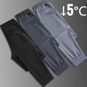 Męskie spodnie 2023 Męskie spodnie sportowe jedwabny jedwabny elastyczne spodnie do joggingu czarne szare fajne sportowe spodnie treningowe duże rozmiary plusl2405