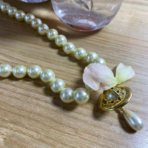 Designer Gold branco Saturn Pearl Cara pingente de pingente planeta jóias punk jóias para mulher