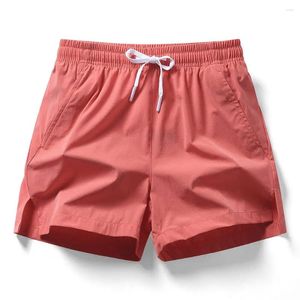 Mäns shorts Aktiv snabb torkning av elastisk midjesport med blixtlåsfickor för att köra resor fast färgbrett ben sommar