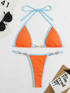 Swimwear femminile da bagno sexy micro bikini 2024 Donne spingendo su perla designer triangolo costume da bagno brasiliano arancione patchwork bareding costume da bagno biquini y240429