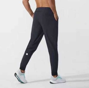 LU LU L Limões Leggings Alinhar Calças Masculinas Yoga Outfit Esporte Secagem Rápida Cordão Bolsos de Ginásio Calças de moletom Calças masculinas Casuais Cintura Elástica Designervspu Calças de grife