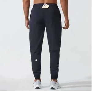 Calças de Yoga LL Mens Jogger Calças Longas Sport Outfit Quick Dry Cordão Ginásio Bolsos Sweatpants Calças Casuais Cintura Elástica Fitness Lu Designer Pants466