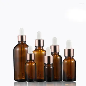 Flaskor 100x 100 ml 50 ml 30 ml 20 ml 15 ml 10 ml 5 ml bärnstensglas Essential Oil Droper Bottle Jar Cosmetic Container Rose Gold Cap