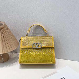 Bolsa com incrustado capaz feminino novo alto valor estético cheio de diamante estilo moderno bolsa de ombro portátil 2024 78% de desconto na loja atacado