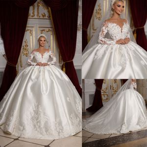 Gorgeous Ball Gown Wedding Dresses Sheer Neck Long Sleeves Bridal Gowns Pearls Lace Appliques Court Train Princess Marriage Gowns Custom Made