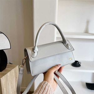 Şık JC En Kalite Tote Çanta Bayanlar Crossbody Omuz Çantaları Mus Deri Luxurys Çanta Çok Çikolo Tasarımcı Çanta Cüzdan