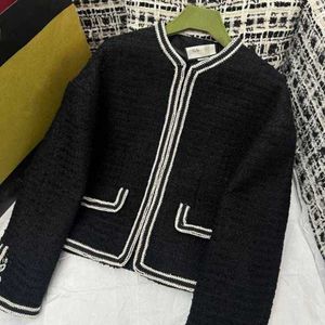 Damskie okopy projektanckie marka wczesna wiosna nowa c elegancki styl celebryty czarny francuski High End Color Cardigan Okrągła szyja płaszcz Itb2