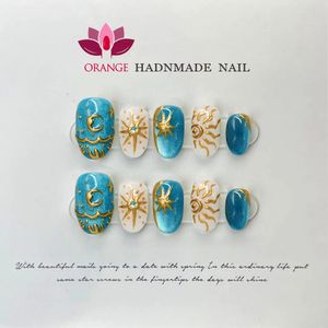 Handgjorda tryck på naglar Blue Cats Eye Moon and Sun Design Fake Nail Full Cover Artificial Manicuree Wearable Orange Nail Store 240201