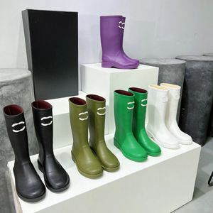 dhgate Shoes女性用豪華な革のブーツデザイナープラットフォーム膝ブーツロングブーツトップクロップウォータープルーフノンスリップゴム濃厚なソールブラックハイレインブーツシューズ